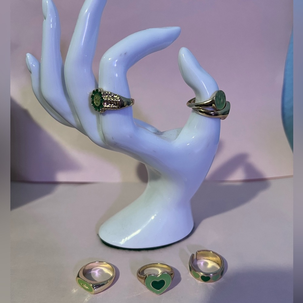 Hand not included, just green and gold rings